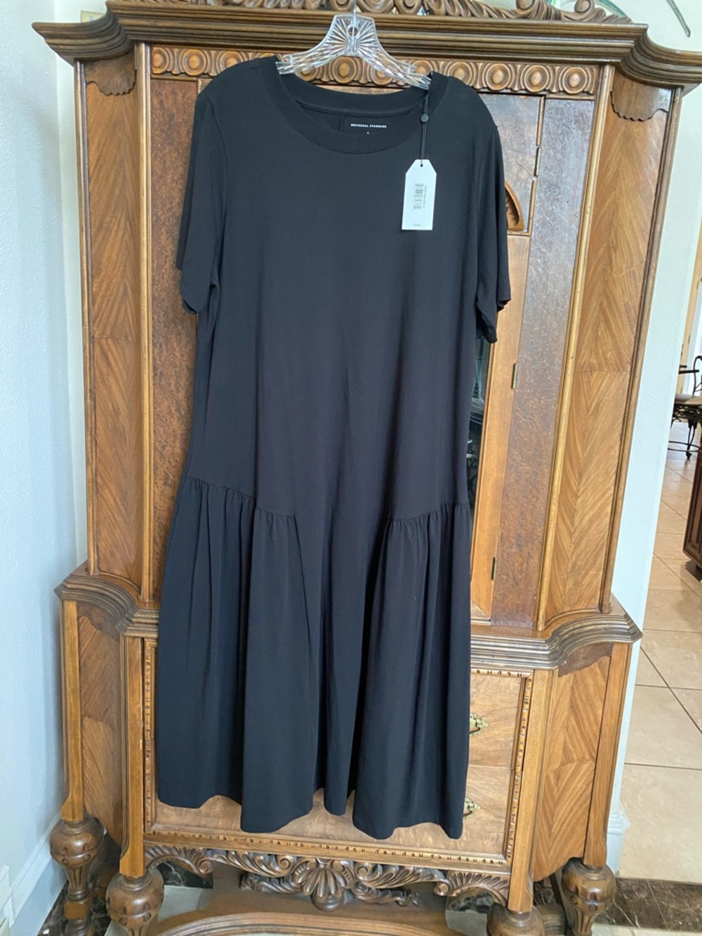 Universal Standard Black Short-Sleeve Tiered Midi Dress with Round Neck
